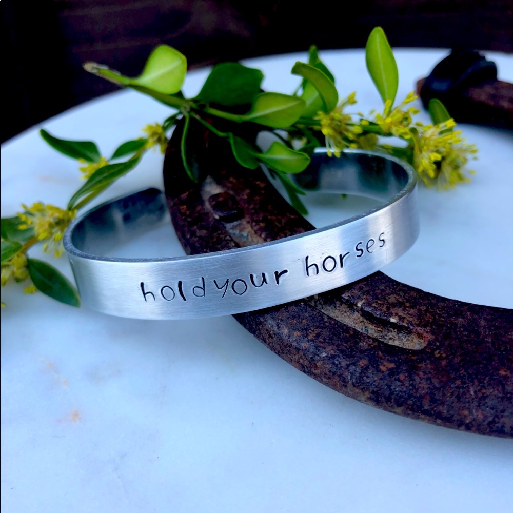 Hand stamped bracelet “hold your horses”